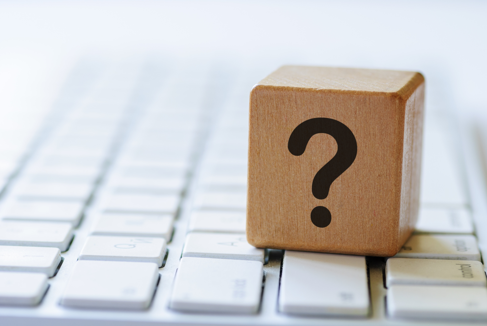 small-wooden-dice-with-question-mark-keyboard